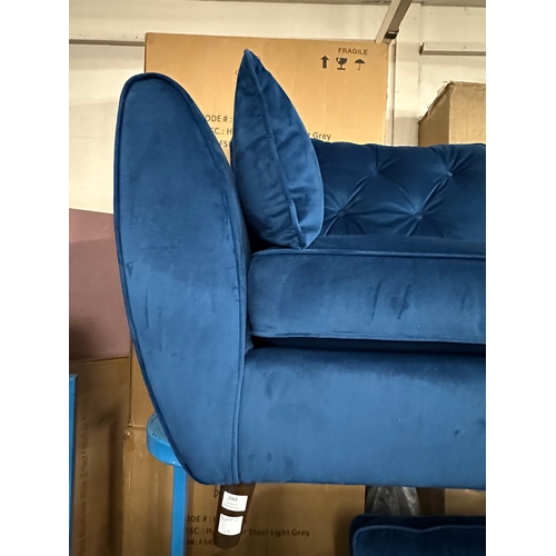 1563 - A Hoxton blue velvet upholstered three seater sofa, RRP £799