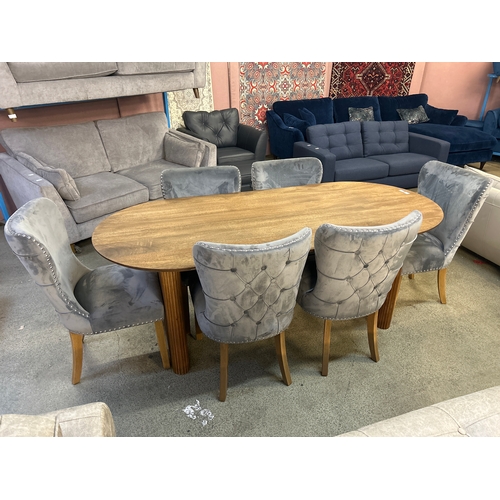 1571 - A mango wood dining table with a set of six grey velvet button backed dining chairs , nail protrudin... 