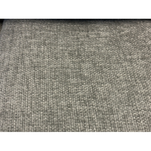 1573 - A grey textured weave upholstered two seater sofa