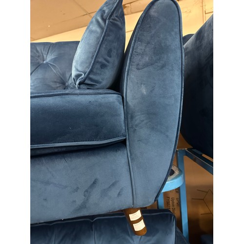 1557 - A Hoxton blue velvet upholstered three seater sofa