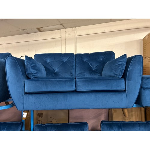 1560 - A Hoxton blue velvet upholstered two seater sofa, RRP £779