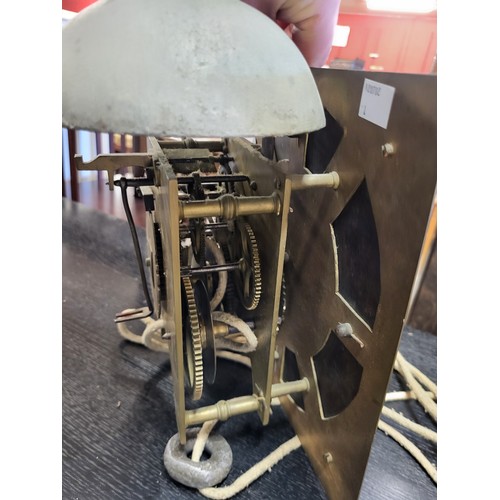 306 - An early 18th Century longcase clock dial and movement by Wooley, Codnor, with pendulum and weight