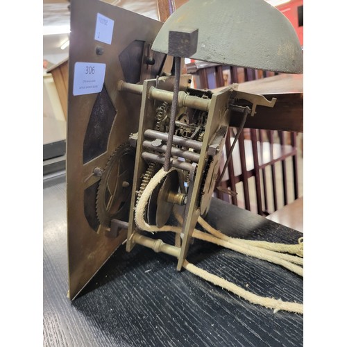 306 - An early 18th Century longcase clock dial and movement by Wooley, Codnor, with pendulum and weight