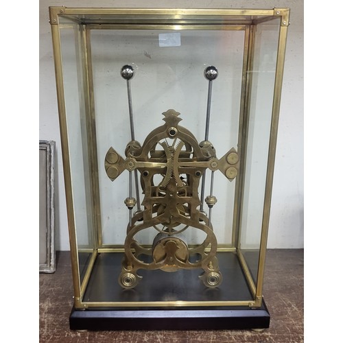 241 - A cased grasshopper pendulum single fusee skeleton clock