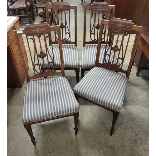 136 - A set of four Edward VII inlaid mahogany dining chairs