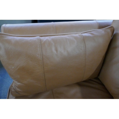 1388 - A tan leather Hoxton love seat, RRP £1539