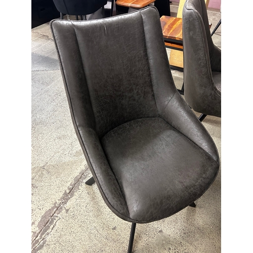 1467 - A Hoxton 1.75m dining table and four dark grey upholstered swivel dining chairs  * this lot is subje... 