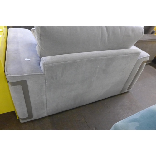 1416 - A grey velvet love seat with steel trim, RRP £2399
