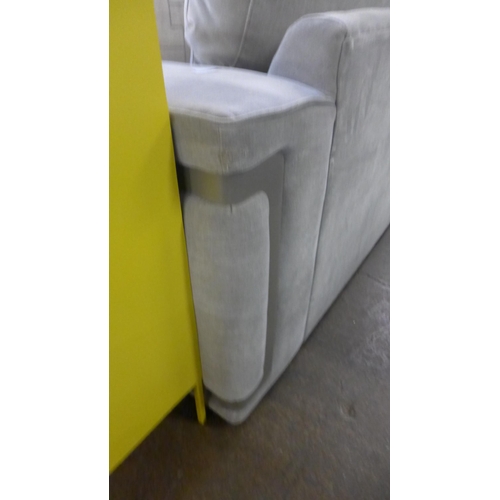 1416 - A grey velvet love seat with steel trim, RRP £2399