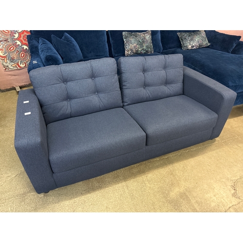 1491 - A dark blue upholstered 2.5 seater sofa
