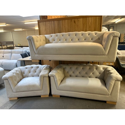 1514 - A Newport brushed cream buttoned velvet three and two seater sofa and armchair *This lot is subject ... 