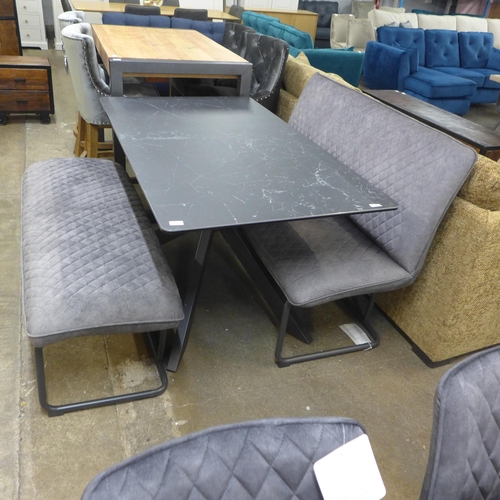 1487 - A charcoal ceramic dining table and two grey upholstered benches * this lot is subject to VAT