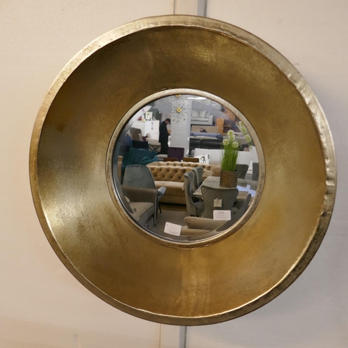 1352 - A circular silver mirror