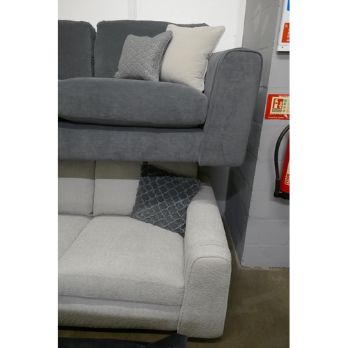 1355 - A steel blue three seater sofa and contrasting off white three seater sofa