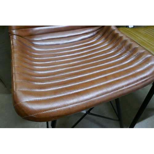 1396 - A chestnut brown leather chair