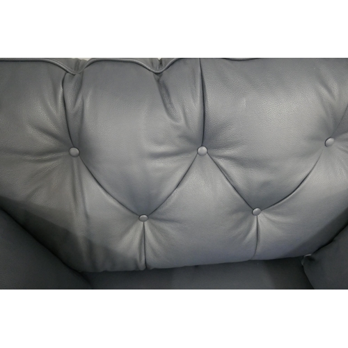 1432 - A blue leather Hoxton love seat