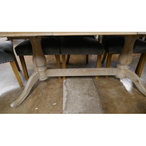 1446 - A Cotswold oak twin pedestal extending table