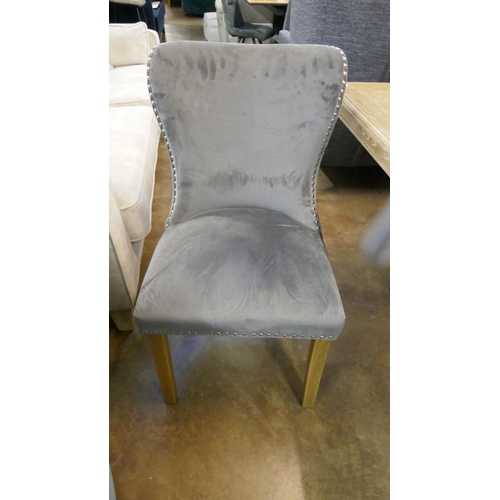 1447 - A set of eight grey velvet buttoned dining chairs * this lot is subject to VAT