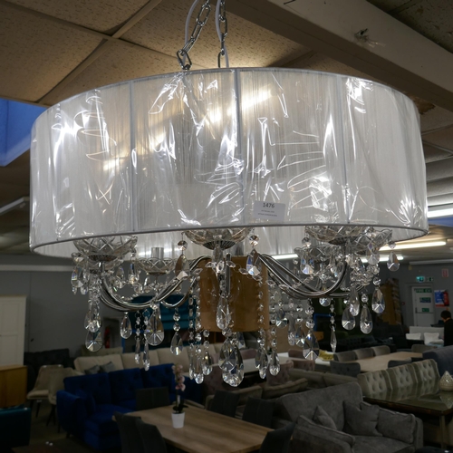 1476 - A chrome eight arm chandelier with white shade