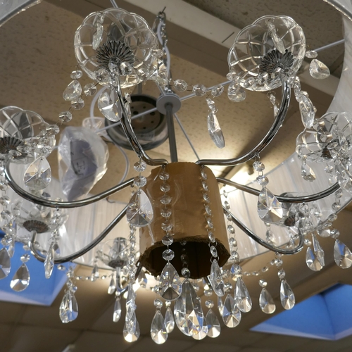 1476 - A chrome eight arm chandelier with white shade