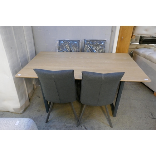 1600 - A grey oak and rattan dining table and four chairs