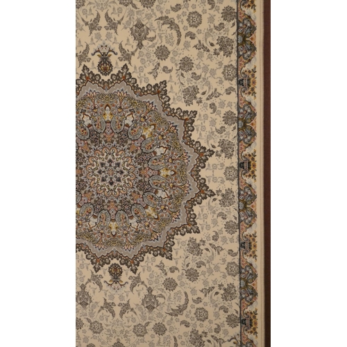 1522 - An ivory ground fine woven iranian runner, embossed floral medallion design, 300cm x 80cm