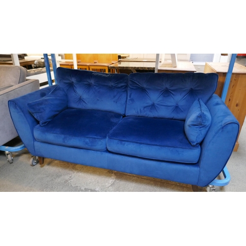 1553 - A pair of blue Hoxton velvet sofas - damaged