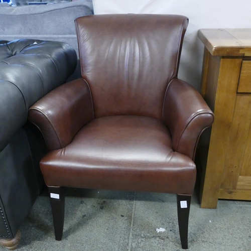 1568 - A chestnut leather side chair