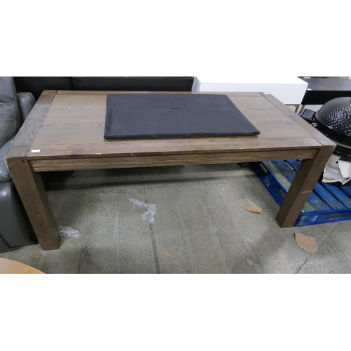 1579 - An oak effect dining table - damaged