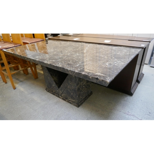 1582 - A mocha marble effect dining table with V-shaped base