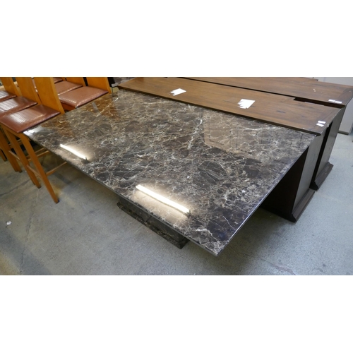 1582 - A mocha marble effect dining table with V-shaped base