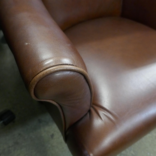 1568 - A chestnut leather side chair