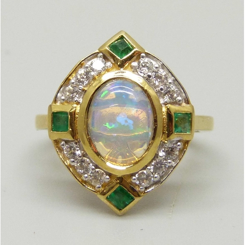 1004 - A silver gilt Welo opal, emerald and zircon ring, L