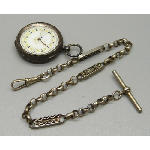 1010 - A 935 silver fob watch lacking glass and one hand with a fancy link Albert chain