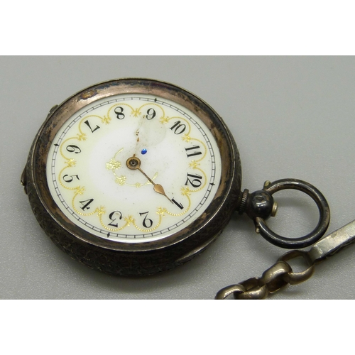 1010 - A 935 silver fob watch lacking glass and one hand with a fancy link Albert chain