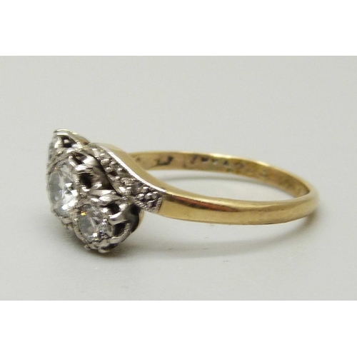 1015 - An 18ct gold and diamond ring, approximately 0.60ct diamond weight, 3.2g, M