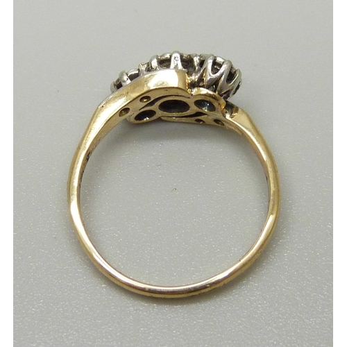 1015 - An 18ct gold and diamond ring, approximately 0.60ct diamond weight, 3.2g, M