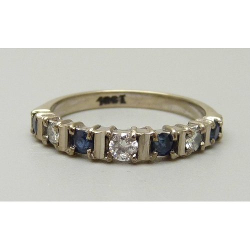 1016 - An 18ct white gold, sapphire and diamond ring, 3.3g, O