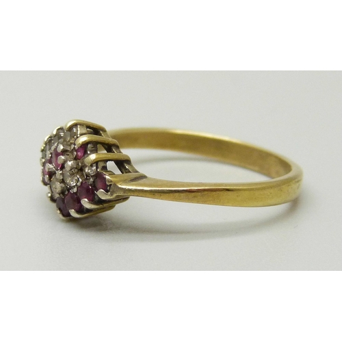 1020 - A silver gilt, ruby and zircon cluster ring, L