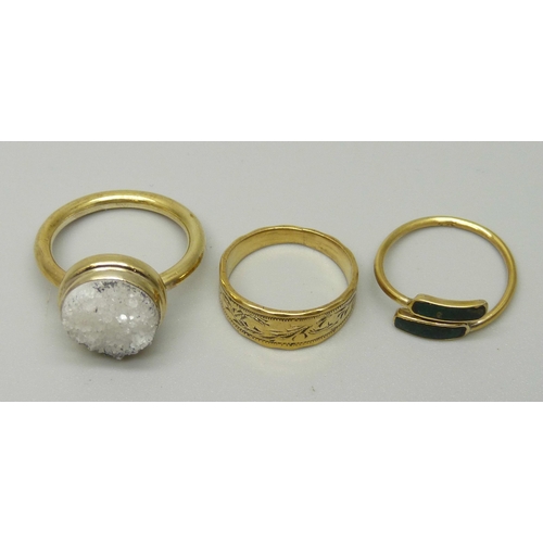 1023 - Three silver gilt rings, K, M and Q