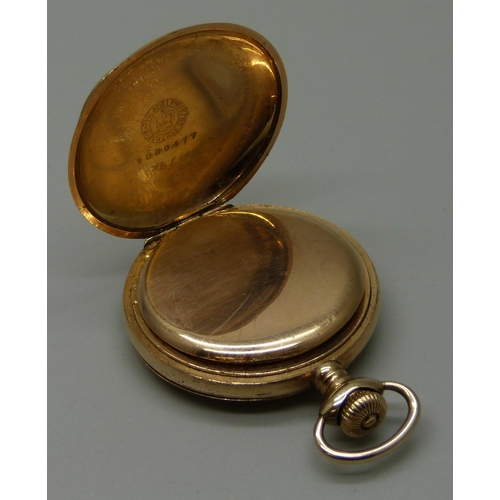 1024 - A Waltham hunter pocket watch with engraved case, cuvette marked '14K Guaranteed 25 Years', 34mm