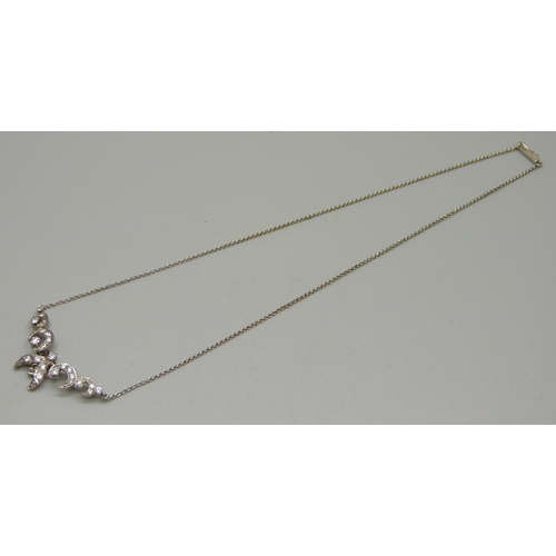 1029 - An 18ct gold and diamond necklace, marked 750, 6.3g, 42cm