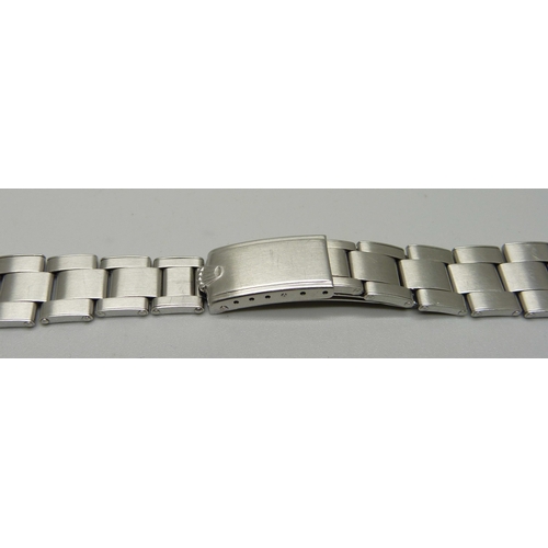 1038 - A vintage Rolex bracelet strap with adjustable strap, ref 57, possibly 1957, length 16cm at smallest... 