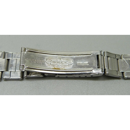 1038 - A vintage Rolex bracelet strap with adjustable strap, ref 57, possibly 1957, length 16cm at smallest... 