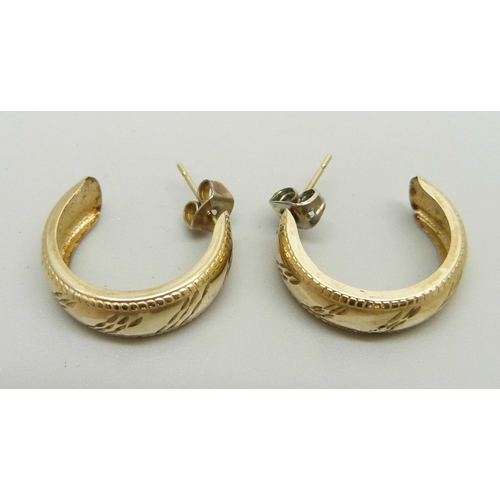 1048 - A pair of 9ct gold hoop earrings, 1.3g