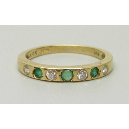 1049 - A 14ct gold, seven stone emerald and zircon ring, marked 14, 2.6g, O