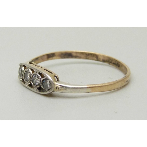 1050 - A 9ct gold and four stone diamond ring, 1.0g, M