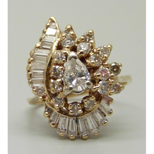 1055 - A 14ct gold, 38 stone diamond ring, circa 1979, over 1 carat of diamonds including unusual pearl sha... 