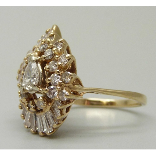 1055 - A 14ct gold, 38 stone diamond ring, circa 1979, over 1 carat of diamonds including unusual pearl sha... 