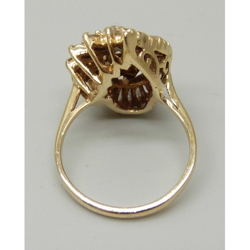 1055 - A 14ct gold, 38 stone diamond ring, circa 1979, over 1 carat of diamonds including unusual pearl sha... 